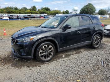  Salvage Mazda Cx