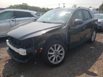  Salvage Mazda Cx